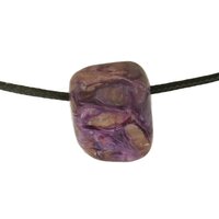 Charoiet met  Tinaksite doorboord